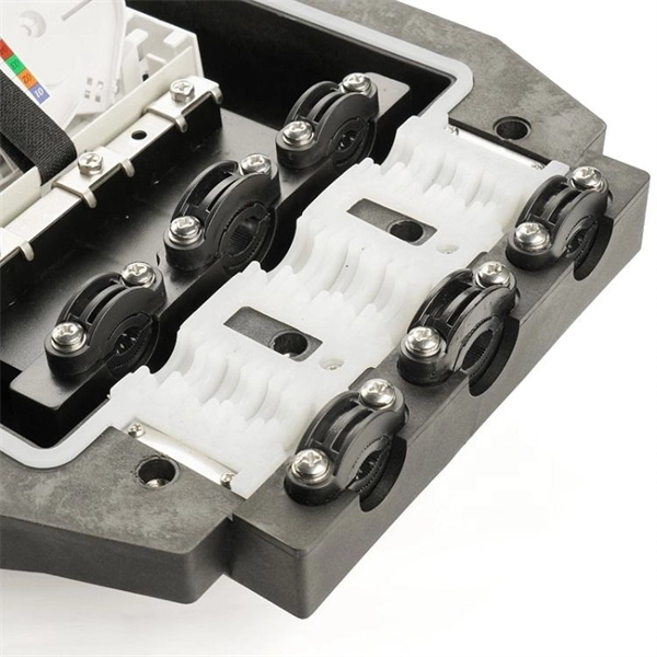 Low-voltage wiring passes through two unconnected cable trays